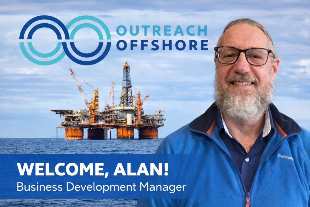 new business development manager for outreach offshore alan with oil rig in the background